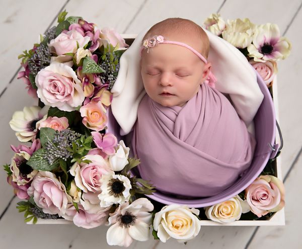 Flowers used in baby girl's photo at newborn photo shoot in Leeds